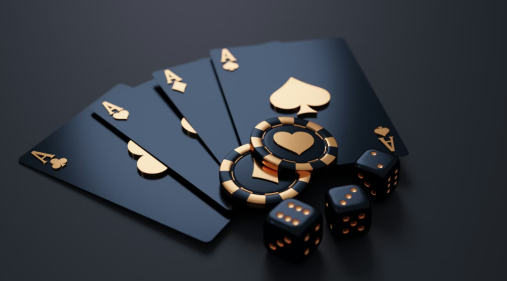 Mustat pelikortit, värilliset pokerimerkit ja nopat pöydällä